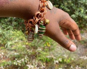 Pulsera con dije de abundancia de cobre