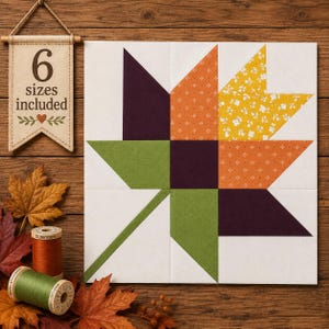 Peut inclure: Un bloc de courtepointe carré présentant un motif de feuille d'érable stylisé composé de pièces de tissu géométriques dans des tons de violet foncé, orange, jaune avec un imprimé floral blanc et vert, sur un fond blanc avec une pancarte indiquant 6 sizes included.