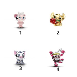 May include: Four metal charms labeled 1 through 4. Charm 1 is a pink and silver character with a bow. Charm 2 is a gold character holding a red rose. Charm 3 is a silver and pink piglet character. Charm 4 is a colorful character wearing a mask.