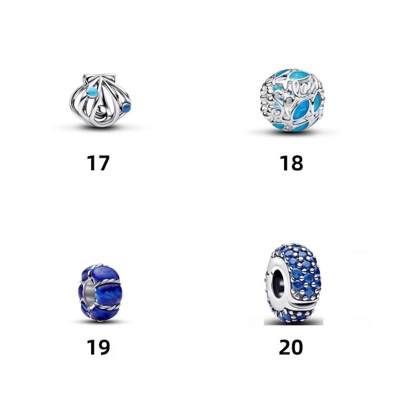 May include: Four silver charms labeled 17 through 20. Number 17 is a shell with blue accents. Number 18 is a spherical charm with blue leaf-like cutouts. Number 19 is a blue stone bead with silver wire wrapping. Number 20 is a silver bead with blue stones.
