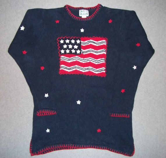 blue sweater with white stars