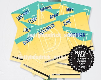 May include: A stack of yellow and teal monthly calendar cards with the months of the year printed in blue. The cards have a geometric design and the words "DIGITAL FILE" are visible on a black and white sticker.