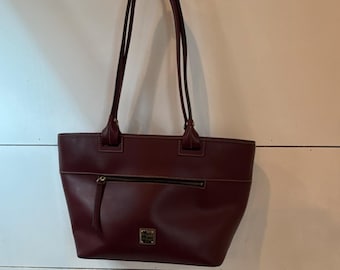 Dooney & Bourke Burgundy Tote Shoulder Bag with Zip Closure and Logo Plaque