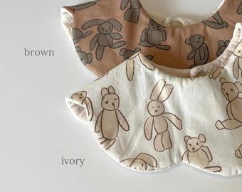 Japanese-made donut-shaped bib with a stuffed toy pattern