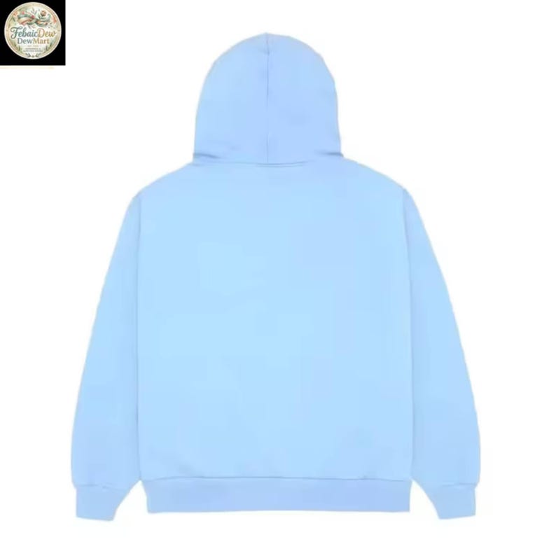 May include: A light blue hoodie with a hood. The back view of the sweatshirt is shown, with the hood up. The hoodie is made of a soft material and is a solid color.