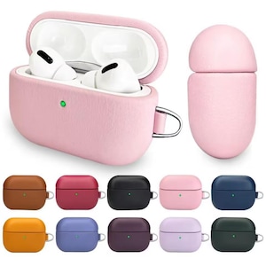 Könnte beinhalten: Ein rosa Lederetui für AirPods Pro mit passendem Deckel und silbernem Karabiner. Das Etui ist geöffnet und zeigt weiße Ohrhörer. Darunter befinden sich mehrere andere farbige Etuis: braun, rot, schwarz, rosa, gelb, blau, lila, helllila und dunkelgrün.