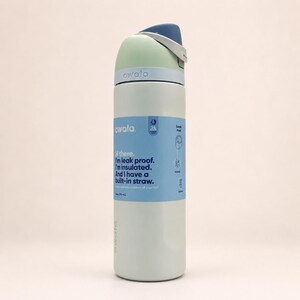 May include: A light green insulated water bottle with a blue and white lid and a built-in straw. A blue label wraps around the center, featuring the text: Hi there. I'm leak proof. I'm insulated. And I have a built-in straw. It also states 24 fl oz.