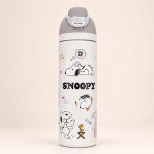 May include: A white stainless steel water bottle featuring Snoopy graphics, the text "SNOOPY", "It's COOL", and "happiness". The bottle has a gray lid with a white "Lift to Unlock" latch mechanism. The design includes illustrations of Snoopy sleeping, dancing, and Woodstock on a stool.
