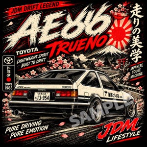 May include: A graphic illustration of a white Toyota AE86 Trueno car on a black background. The design features red cherry blossoms, a rising sun, Mount Fuji, and text including JDM DRIFT LEGEND, TOYOTA, and PURE DRIVING PURE EMOTION.