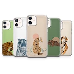 May include: Five clear smartphone cases featuring various tiger illustrations. The designs include tigers in orange, black, and blue tones set against solid backgrounds of light green, white, beige, and dark green, with circular sun motifs.