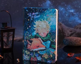 Cuaderno A5 de El Principito: Planeta de los Sueños, tapa dura, páginas ilustradas.