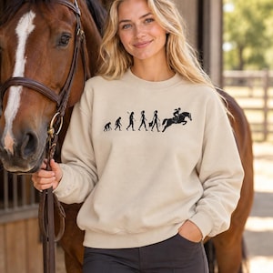 Reiterin Sweatshirt -Sweatshirt mit Evolution-Motiv, Gildan 18000 aus Baumwoll-Polyester-Mischgewebe, Unisex Pullover in 7 Farben
