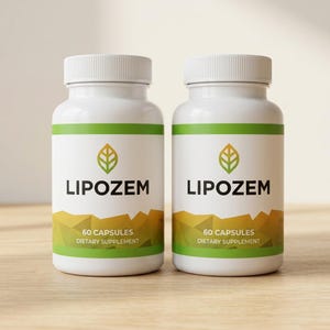 May include: Two white supplement bottles with green and gold labels. The labels read "LIPOZEM" in bold black letters, with a leaf logo above. Below the name, it says "60 CAPSULES" and "DIETARY SUPPLEMENT". The bottles have white caps.