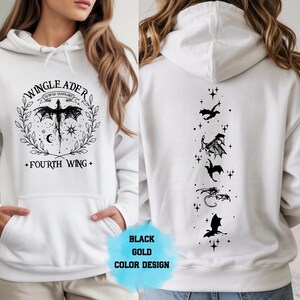 May include: White hoodie with a black and gold dragon design. The front features a dragon graphic with the text "WINGLEADER" and "FOURTH WING". The back displays a vertical line of dragon silhouettes. The design is labeled "BLACK GOLD COLOR DESIGN".