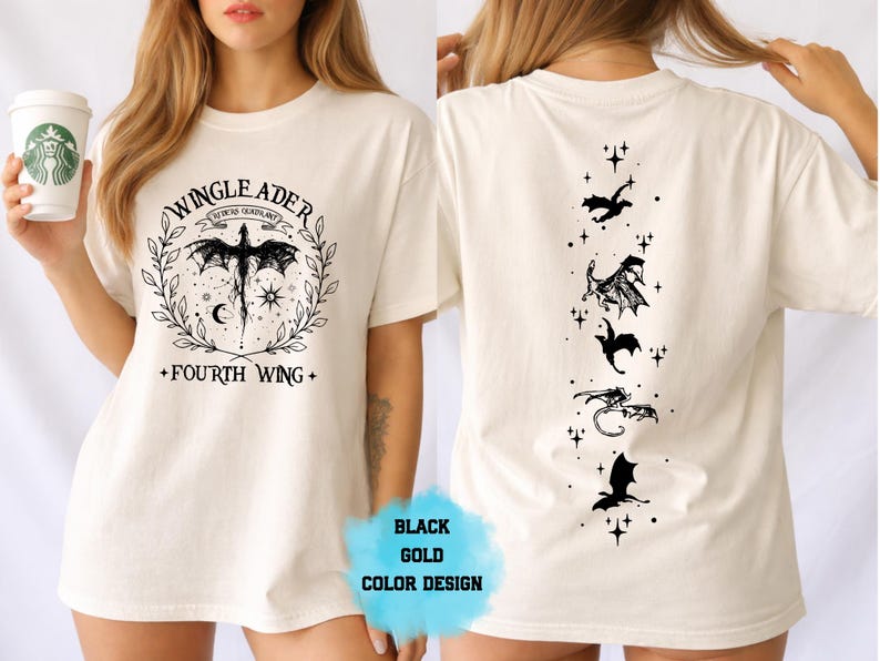 May include: Cream-colored t-shirt with a black dragon graphic and text that reads "WINGLEADER" and "FOURTH WING". The back of the shirt features a vertical line of black dragon silhouettes and stars.