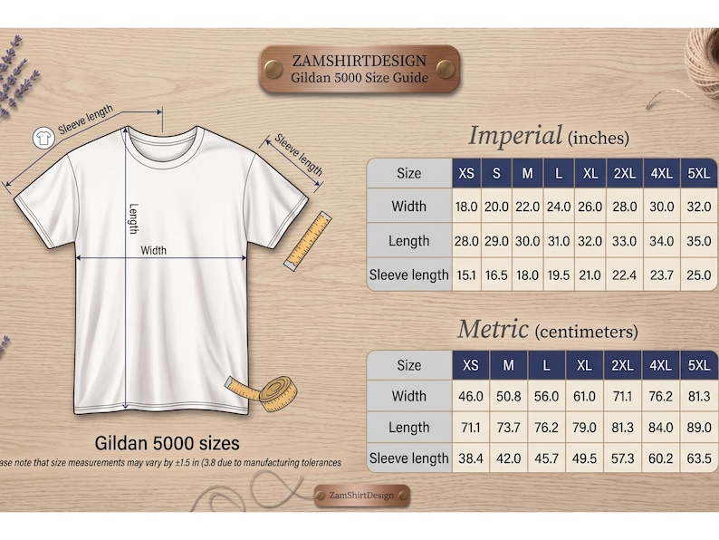 May include: White Gildan 5000 t-shirt size guide with measurements in inches. The guide includes width, length, and sleeve length for sizes XS to 5XL. The image also shows a t-shirt outline with measurement lines and a measuring tape.