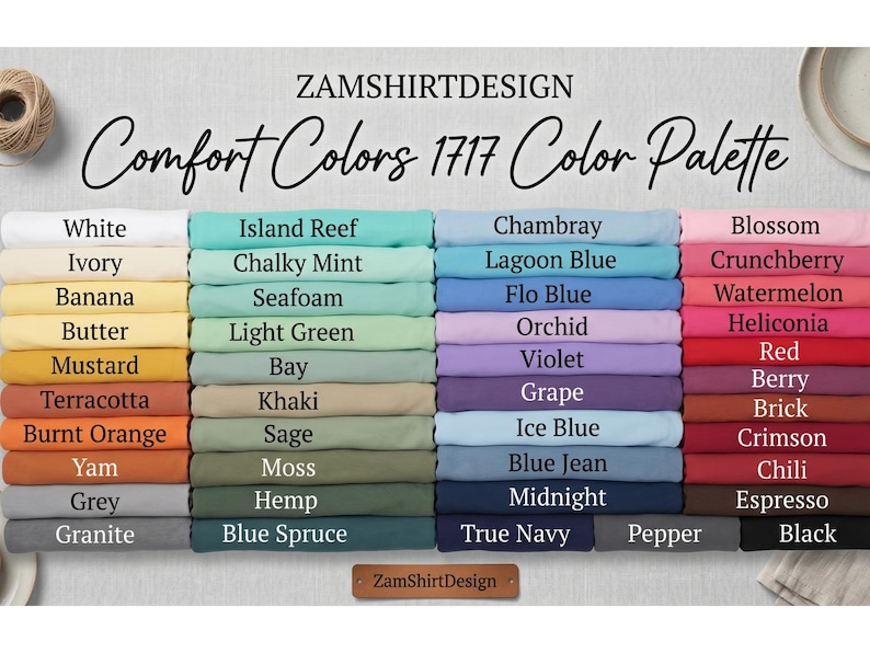 Pode incluir: Uma tabela de paleta de cores da ZamShirtDesign, apresentando a "Paleta de Cores Comfort Colors 1717". A tabela exibe uma variedade de cores, incluindo branco, azul, verde, amarelo, laranja, vermelho e preto, com cada cor rotulada.