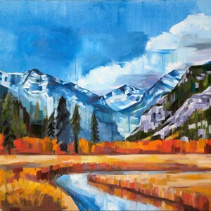 May include: A painting of a mountain landscape with a river flowing through a field of fall foliage. The mountains are snow-capped and the sky is blue with white clouds. The river is blue and the field is a mix of orange, yellow, and red.
