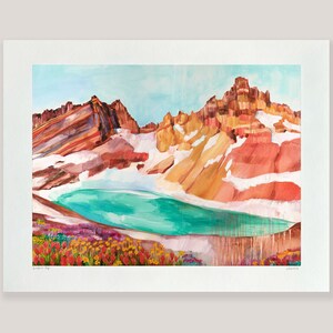 May include: A watercolor painting of a mountain range with a turquoise lake in the foreground. The mountains are painted in shades of red, orange, and yellow, with white snow on the peaks. The lake is surrounded by a field of wildflowers in shades of red, orange, and yellow.
