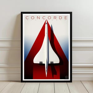 May include: Framed poster featuring a white Concorde jet against a red and blue backdrop. The word "CONCORDE" is printed in red at the top, with "AIR FRANCE" below. The image is framed in a black border.