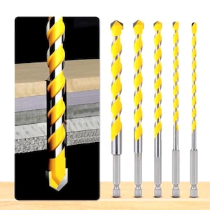 May include: A set of yellow and silver drill bits with a spiral design. The drill bits have a hexagonal base and are designed for use with various materials. The image shows a close-up of the drill bits, highlighting their sharp edges and durable construction.