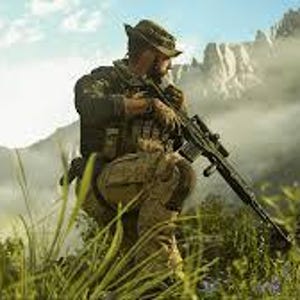 K&ouml;nnte beinhalten: Eine Person in Tarnkleidung, die einen Hut tr&auml;gt und ein Gewehr h&auml;lt. Die Person befindet sich in einer nat&uuml;rlichen Umgebung im Freien mit Bergen im Hintergrund. Das Bild konzentriert sich auf milit&auml;rische Ausr&uuml;stung und Outdoor-Aktivit&auml;ten.