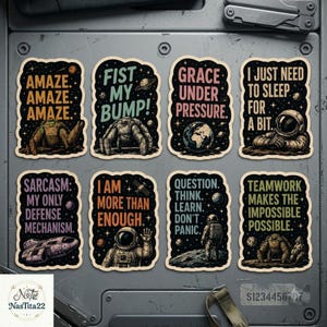 May include: A set of eight rectangular stickers with rounded corners, each featuring a black space background with stars and planets. The stickers contain various illustrations of astronauts, space creatures, and spacecraft, accompanied by motivational or humorous text in bold, colorful lettering.