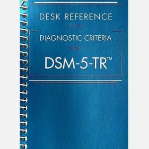 May include: A blue spiral-bound book titled Desk Reference to the Diagnostic Criteria from DSM-5-TR. The cover features white text with thin horizontal lines above and below the title, enclosed in a rectangular border on a solid blue background.