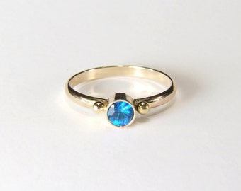 Solid Gold Apatite Ring (Natural Neon Blue Apatite), 4mm x 0.27 Carat, Round Cut, 14 Karat Solid Gold Handmade Ring