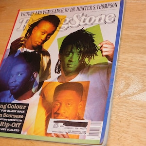 May include: A Rolling Stone magazine cover featuring multiple portraits of men with dreadlocks and colorful backgrounds. The cover includes text such as "Victory and Vengeance, by Dr. Hunter S. Thompson" and "Living Colour".