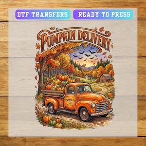May include: A DTF transfer sheet featuring an orange truck loaded with pumpkins, labeled PUMPKIN CO. EST. 1958. The graphic includes the text PUMPKIN DELIVERY, DTF TRANSFERS, and READY TO PRESS, set against an autumn landscape with trees and bats.