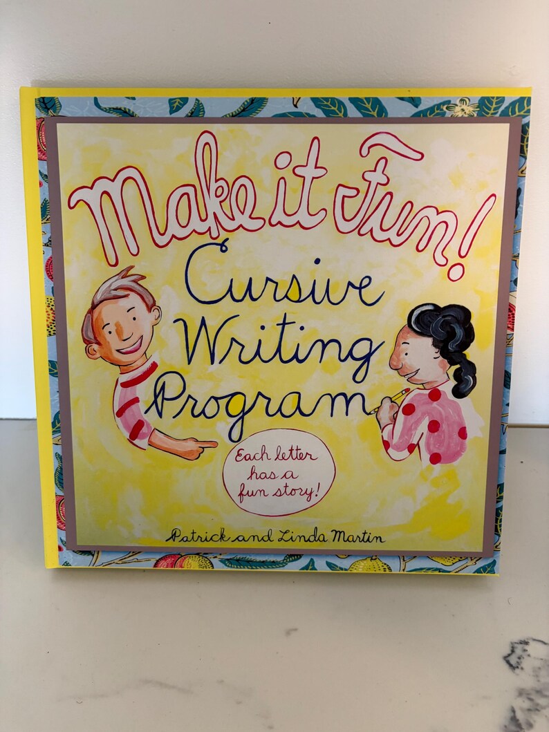 May include: A hardcover book titled Make it Fun! Cursive Writing Program by Patrick and Linda Martin. The cover features a yellow background with illustrations of two children and the text Each letter has a fun story! framed by a blue floral border.