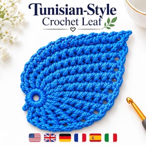 May include: A bright blue Tunisian-style crochet leaf with a central stem and openwork edges. The text Tunisian-Style Crochet Leaf is printed above the leaf, and a gold-colored crochet hook is positioned at the bottom right corner.