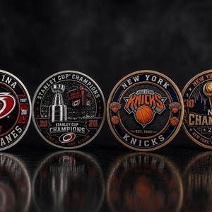 May include: Four circular commemorative coins featuring sports team logos and championship themes. Two coins display Carolina Hurricanes branding, while two coins feature New York Knicks imagery, including basketballs and NBA championship trophies.