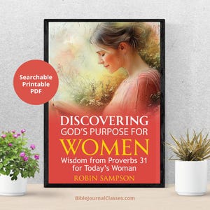 May include: A framed print with the title "Discovering God's Purpose for Women." The artwork features a woman reading, with text below that reads "Wisdom from Proverbs 31 for Today's Woman" by Robin Sampson. A red circle with the text "Searchable Printable PDF" is in the upper left.