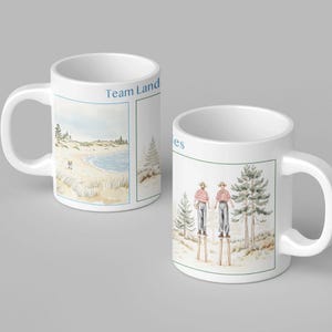 Peut inclure: Mug en céramique blanche avec une illustration à l'aquarelle. Un côté présente une scène de plage avec le texte "Team Land". L'autre côté représente deux personnes sur des échasses. Idéal pour le café ou le thé.