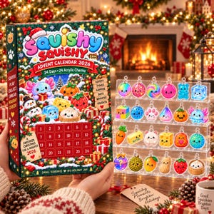 May include: A Squishy Squishy Advent Calendar 2026 box featuring 24 days of acrylic charms, displayed alongside a clear four-tier stand holding 24 colorful, character-themed charms including fruits, animals, and food items with metal loops.