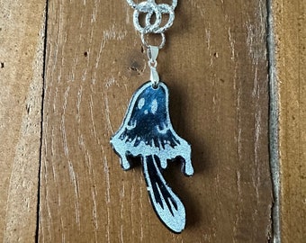 Black and White Resin Ghost Mushroom Holographic Blue on a Chunky Round Necklace