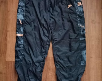 Vintage Nike trainingsbroek jaren 80 90s logo | Maat XL | Grijs | Polyester retro streetwear sportkleding