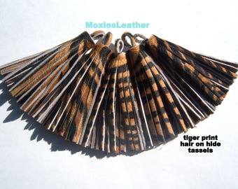 Tiger print leather fur on - hair on tiger print leather skin - leather hair on hide tassles- tassels wholesale hair on, animal print tassel