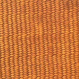 May include: A close-up of a woven fabric with a herringbone pattern. The fabric is a light brown color.