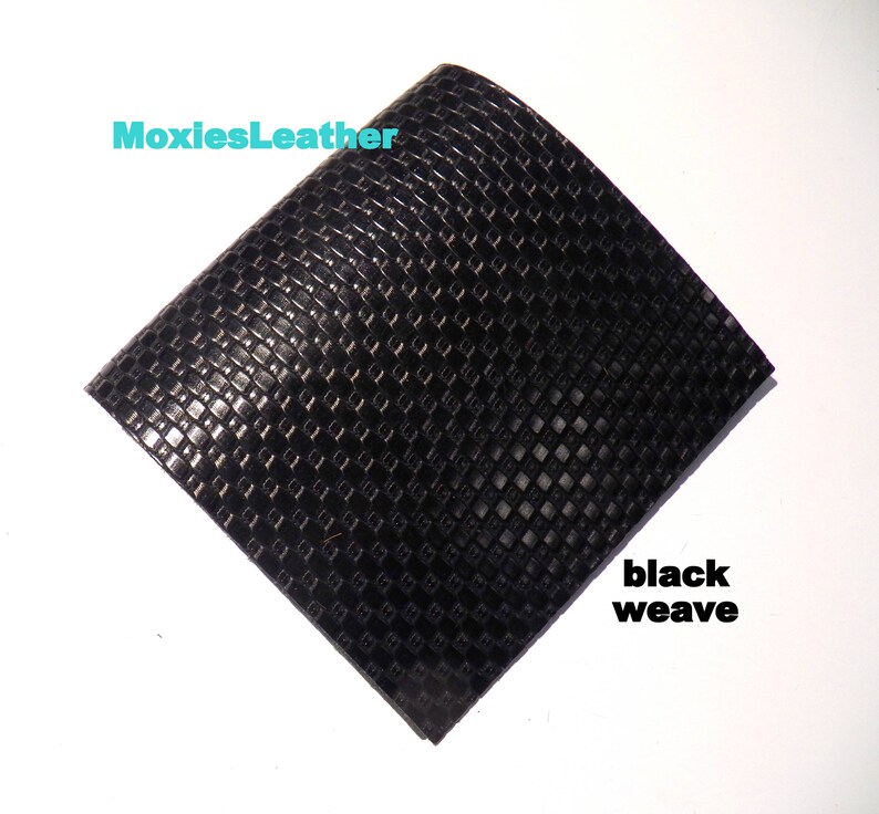 May include: Black leather with a woven pattern. The leather is labeled "black weave".