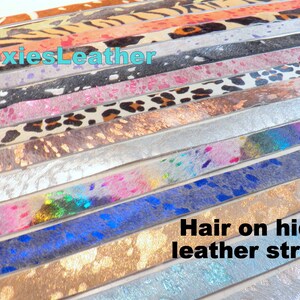 May include: A variety of hair-on-hide leather strips in different colors and patterns, including leopard print, tiger print, and cowhide. The strips are arranged in a stack, with the text "MoxiesLeather" and "Hair on hide leather strips" visible at the top and bottom of the image.