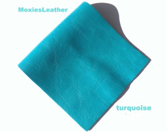 Turquoise leather for earrings , leather scraps , leather remnants , earrings leather , leather sheets .