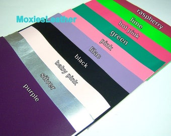 May include: A selection of leather sheets in various colors, including purple, silver, baby pink, black, lilac, pink, green, hot pink, lime, and raspberry.