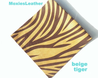 50% off snow tiger genuine leather suede pieces , aztec prints, tiger prints/  leather print sheets/   leather to use with cutting machines