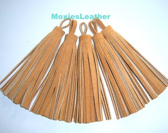 suede tassels ,moxiesleather tassels , tan suede tassels, black,navy,brown ,green, red, cream . taupe tassels .