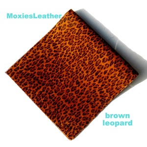 Może przedstawiać: Brązowa skóra z wzorem lamparta. MoxiesLeather.