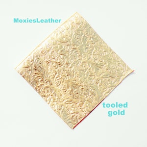 gold tooled leather collection earrings, gold tiger, gold stripes leather for jewellery , metallic prints, leather sheets moxies leather