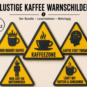 May include: A collection of five yellow and black warning signs with coffee-themed designs. Each sign features a black triangle with a coffee cup graphic and German text. The signs include phrases like "Coffee Zone" and "Coffee instead of therapy."